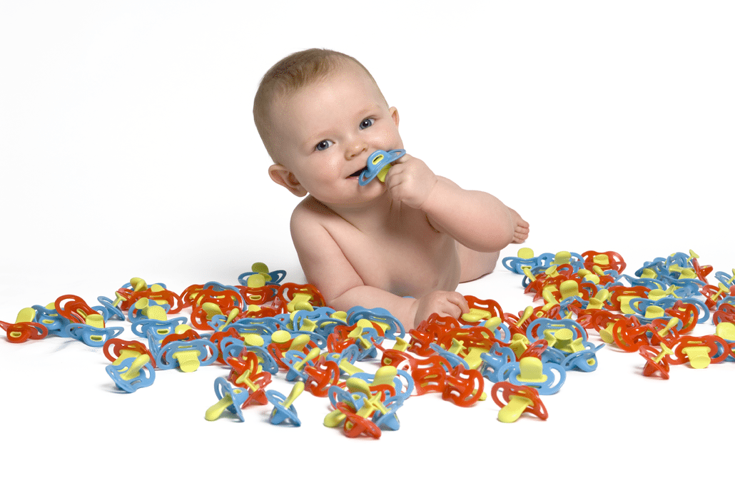 Baby with dummies