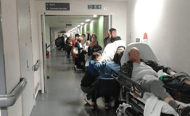 Waiting on Trollies in Hospital Corridor