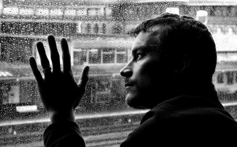 Blue Monday sad man and rain