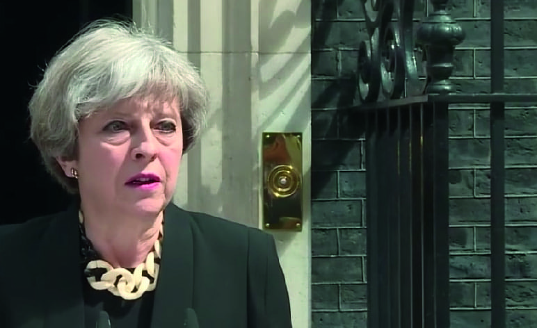 Theresa May immigration racial profiling