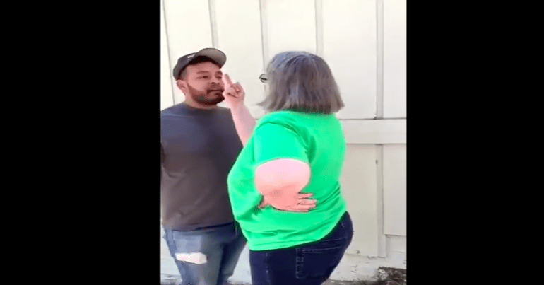White woman racially abusing Latino man