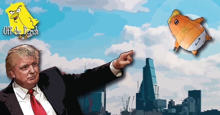 Trump pointing at the Trump Baby Blimp floating in the air