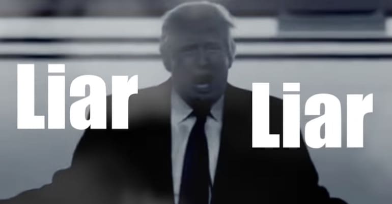 Donald Trump with the words 'Stop Trump' written over the top