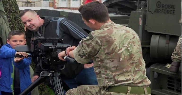 War School - Young child with heavy machine gun Armed Forces Day 770 x 403