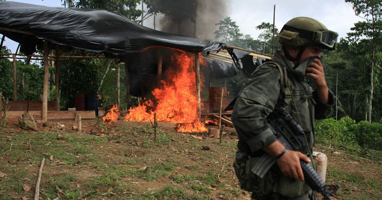 Coca lab burning, pictured in Tumaco, Colombia.