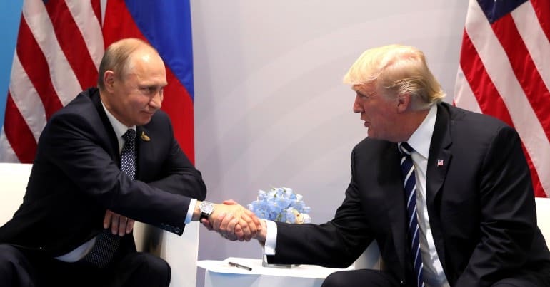 A picture of Vladimir Putin and Donald Trump shaking hands