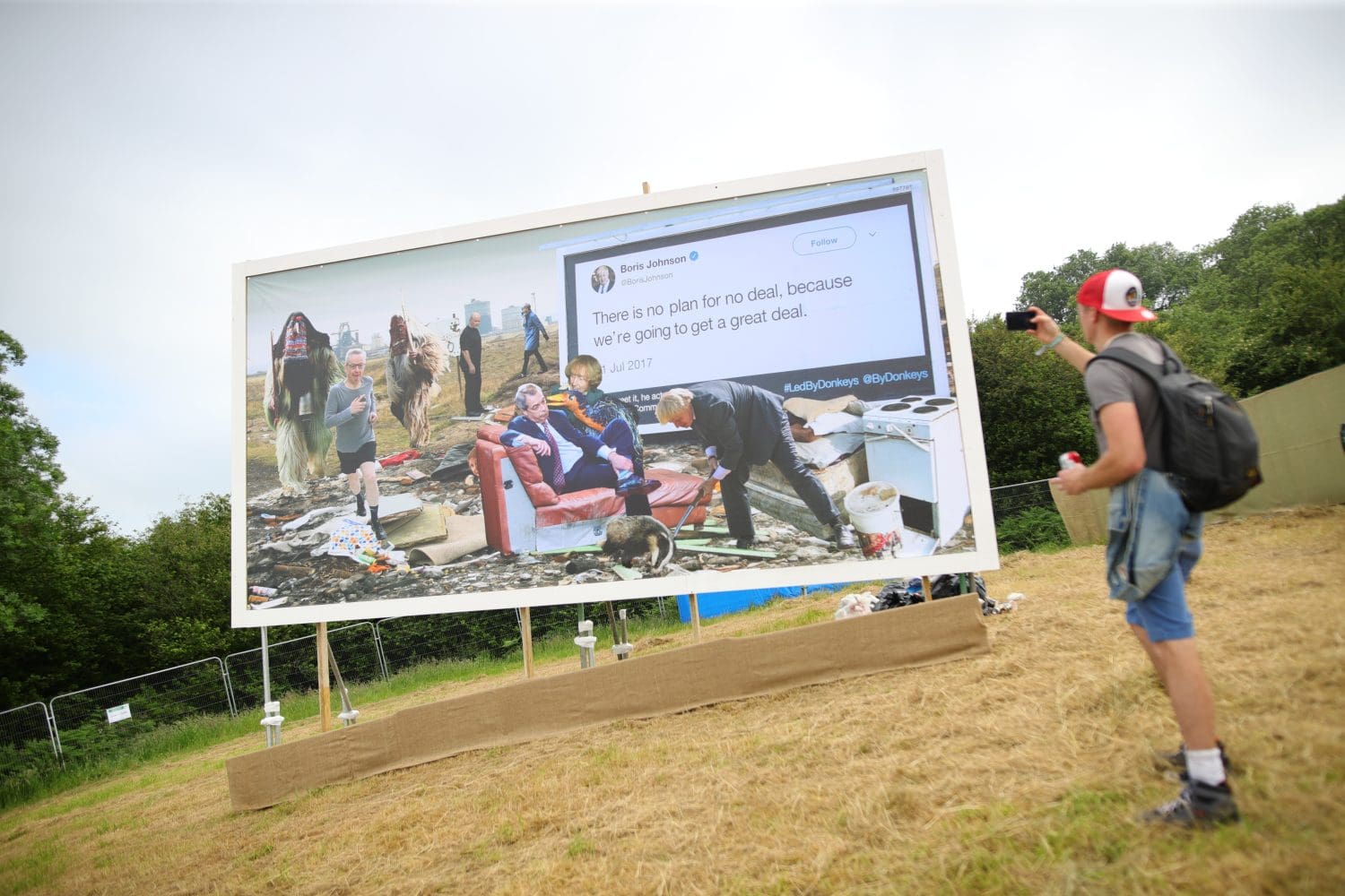 Anti-Brexit campaigners take aim at Johnson with Glastonbury billboard
