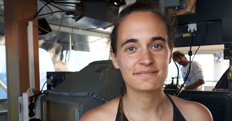 Aid ship captain arrested after migrants step on to Italian island