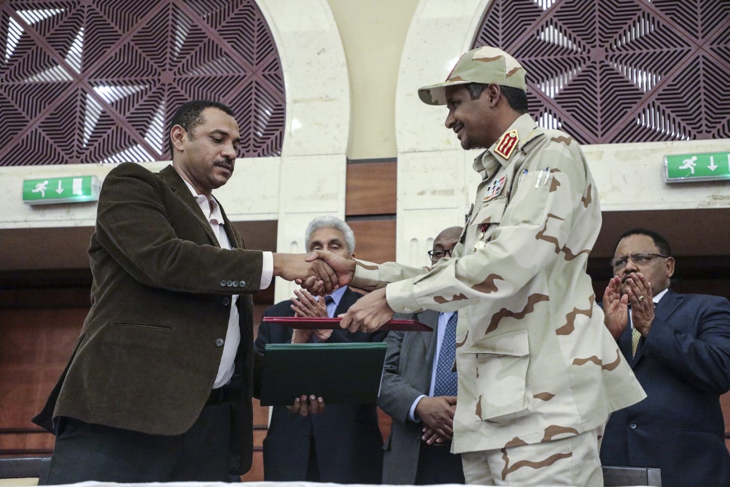 Sudanese military and protesters sign powersharing document