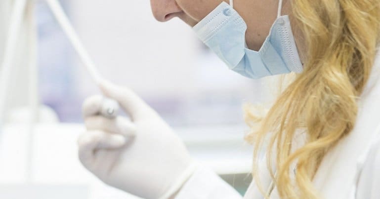 A doctor wearing a mask