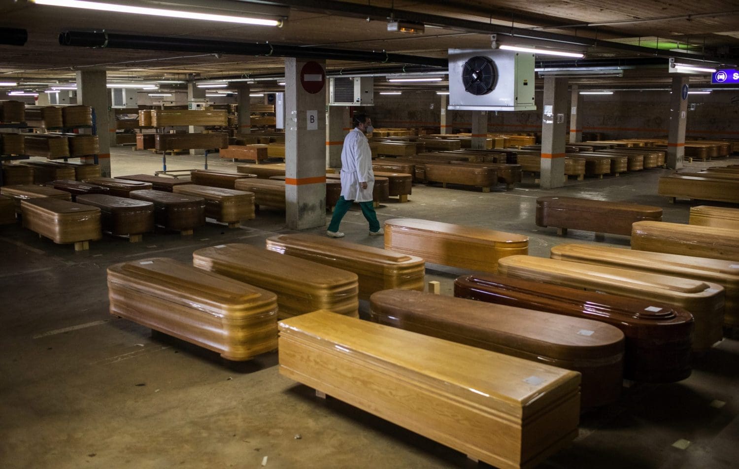 Spain’s coronavirus death toll hits 10,000 as global infections near a million