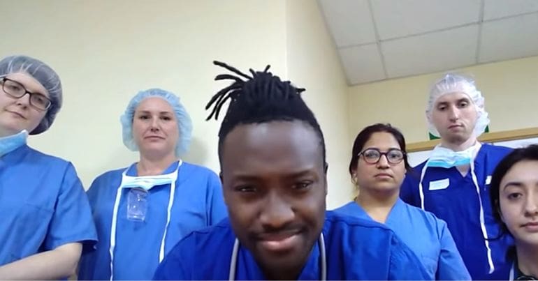 Medical staff speaking to Channel 4 News