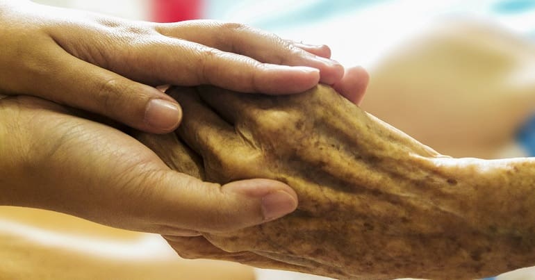 A young and an old hand