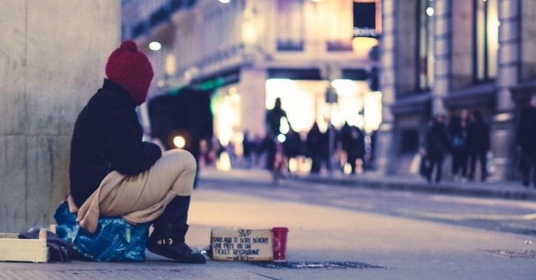 Person sitting on street
