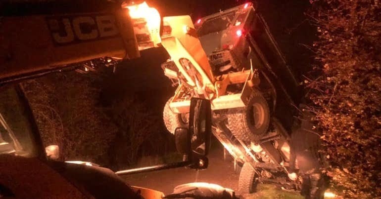 JCB flips activists vehicle