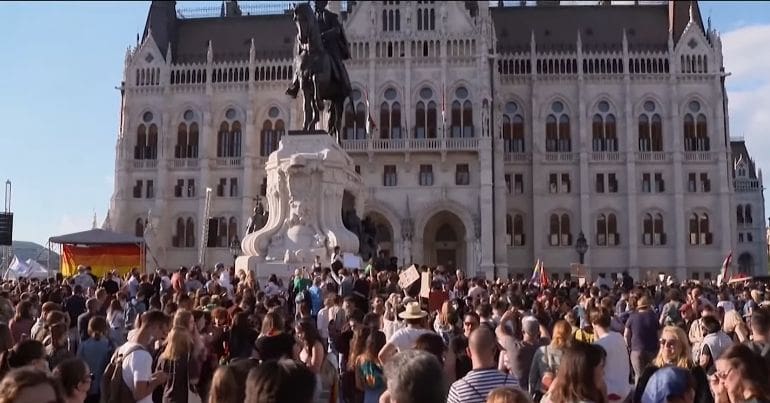 protestors lgbt law hungary