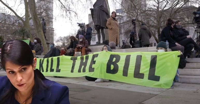 Priti Patel and a #KillTheBill banner