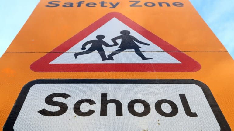A school crossing sign