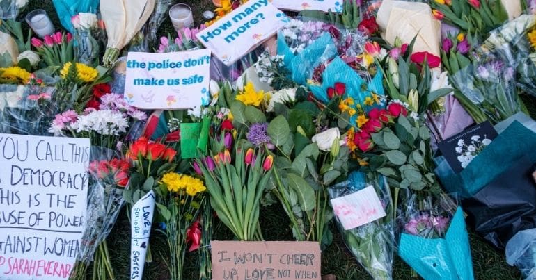 Flowers and notes at demonstration following the murder of Sarah Everard