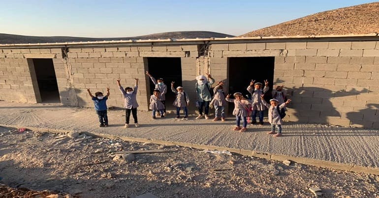 Kids outside the school in Al-Maleh Jordan Valley