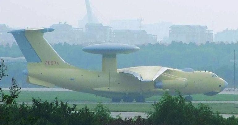 Chinese surveillance plane sits on a smoggy runway.