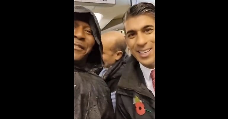 Rishi Sunak wearing a red poppy