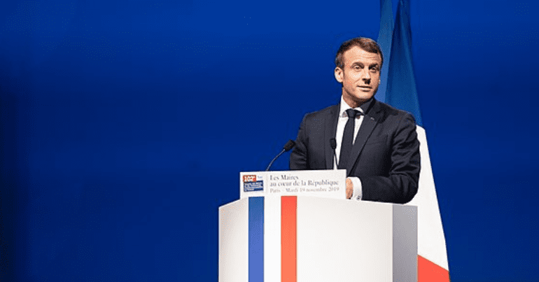 Macron at a podium