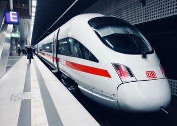 Deutsche Bahn train on a platform workers