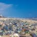 Image shows plastic pollution covering Accra beach, Ghana INC