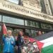 Neil Goodwin with supporters outside court with the Palestinian flag Israel