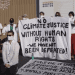 Climate protesters at COP27 with a banner that reads: No climate justice without human rights. We have not been defeated!