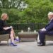 Laura Kuenssberg sat on a garden terrace interviewing Boris Johnson.
