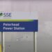 Sign for SSE Peterhead Power Station, with smoke in the background carbon capture and storage