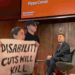 Wes Streeting faced protests over both DWP PIP cuts and NHs privatisation at a Guardian Live event at Conway Hall
