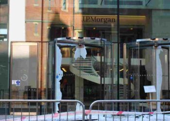 JP Morgan front doors completely shattered with glass everywhere by Palestine Action