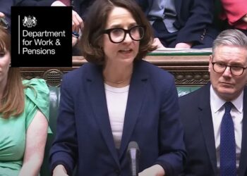DWP logo superimposed over DWP boss Liz Kendall stood announcing the Pathways to Work Green Paper in the House of Commons in March, with Angela Rayner on the right, and Keir Starmer to the left of the image.