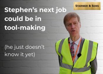 Stephen Timms in high-vis vest. A white-grey wall behind him with a gold plaque reading 'Starmer & Sons' and text in white saying: Stephen's next job could be in tool-making (he just doesn't know it yet) DWP
