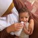 Palestinian mother feeding her crying baby milk from a bottle Gaza unborn children