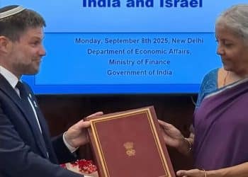 Bezalel Smotrich and Nirmala Sitharaman sign bilateral investment agreement, holding it between them Israel India trade deal