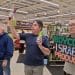 Palestine activists stand in a Sainsbury's store holding products made in Israel with a sign saying "Boycott Israeli products" Belfast
