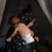 Palestinian mother holds her malnourished baby in a tent in Gaza IRC children