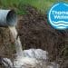 A sewage pipe and the Thames Water logo