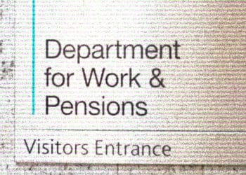 DWP PIP entrance sign at Caxton House with a grainy texture applied over the image.