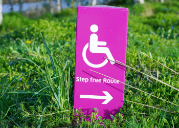 purple tuesday - purple sign with symbol of wheelchair user and the words "step free route"